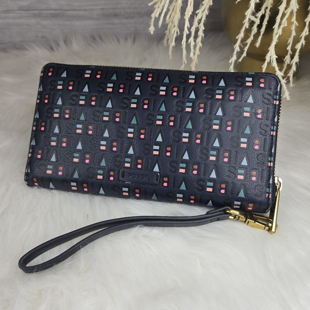Fossil Caroline RFID Zip Around Wallet with a "Vibes" print.